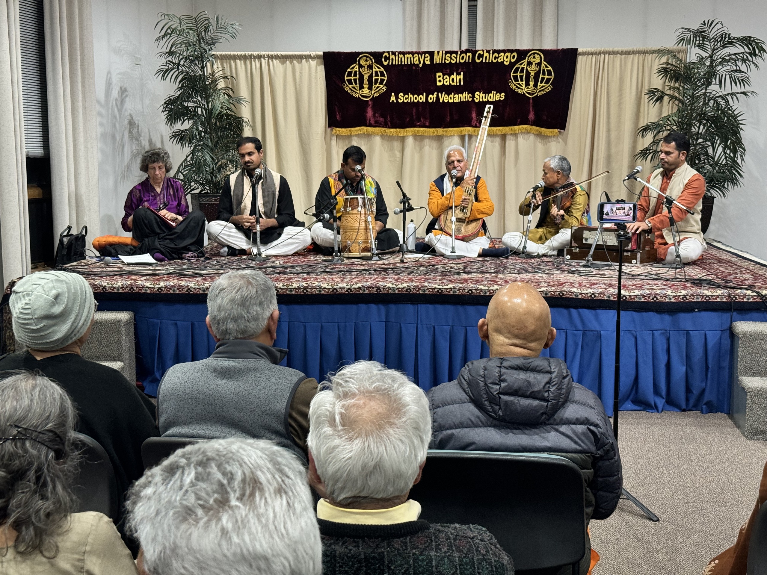 Audience and ensemble in a public performance