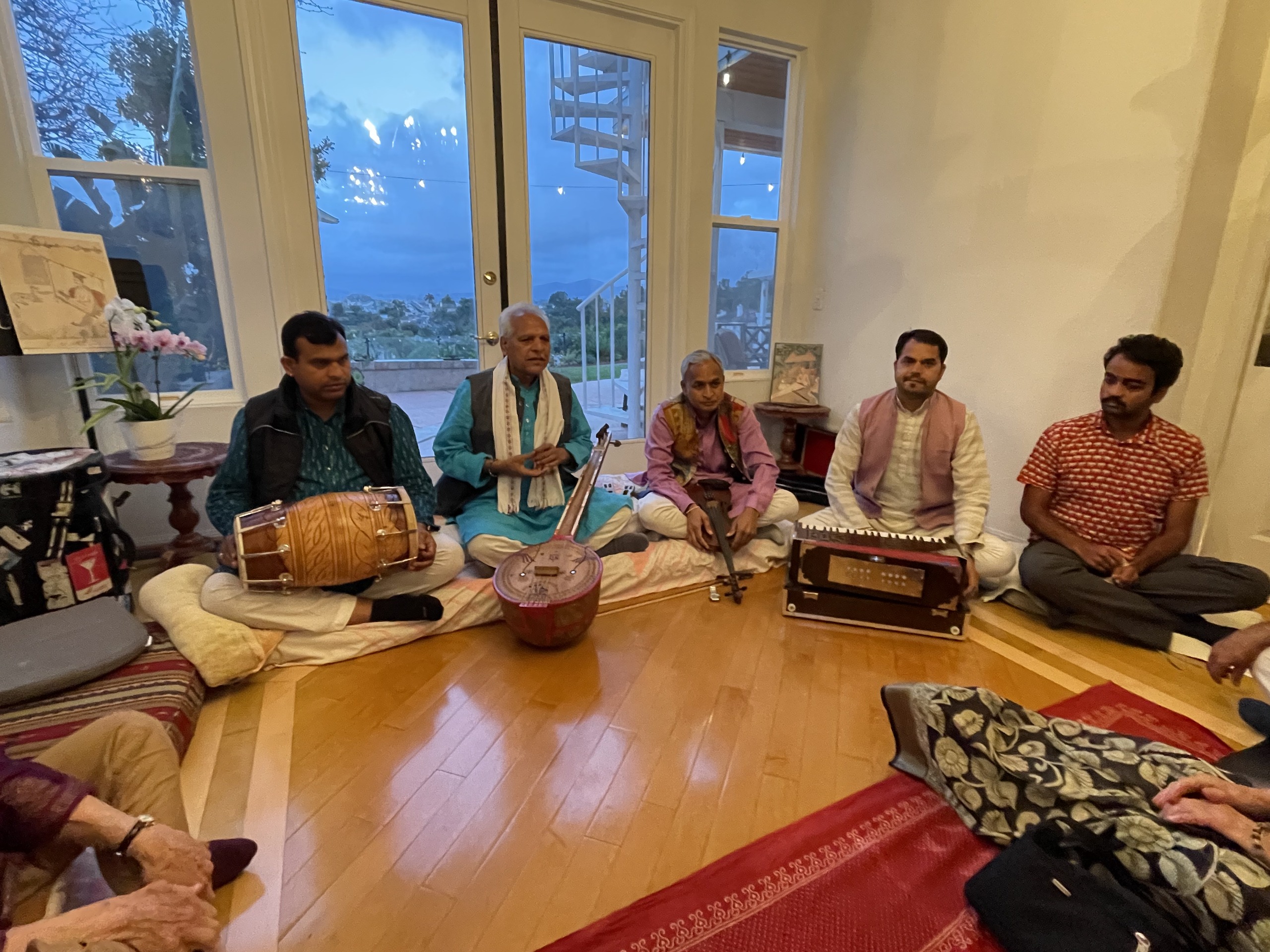 Intimate bhajan gathering in a home